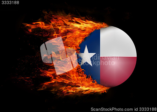 Image of US state flag with a trail of fire - Texas