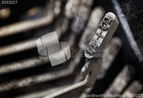 Image of S hammer - old manual typewriter - mystery smoke