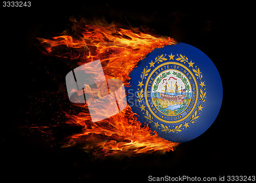 Image of US state flag with a trail of fire - New Hampshire