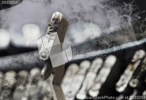 Image of Half hammer - old manual typewriter - mystery smoke