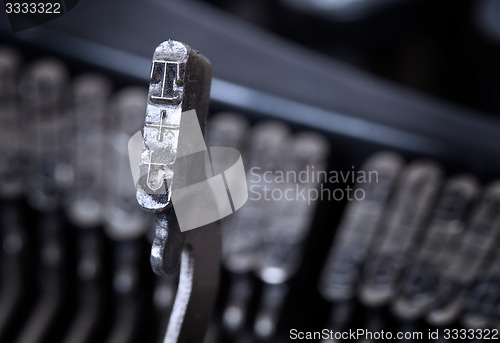 Image of T hammer - old manual typewriter - cold blue filter