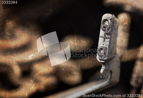 Image of Q hammer - old manual typewriter - warm filter