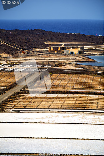 Image of coastline salt in  lanzarote pond rock stone sky  