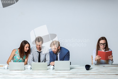 Image of Business team working on their business project together at office