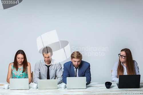 Image of Business team working on their business project together at office