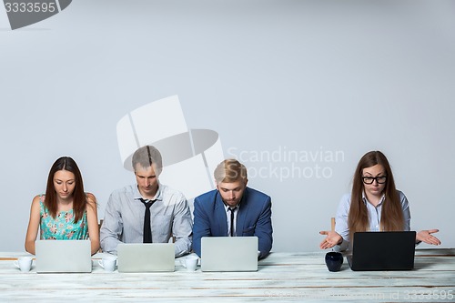 Image of Business team working on their business project together at office