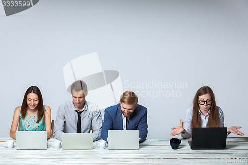 Image of Business team working on their business project together at office