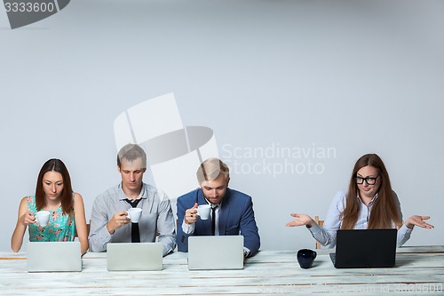 Image of Business team working on their business project together at office