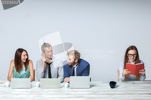 Image of Business team working on their business project together at office