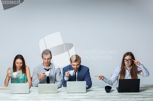 Image of Business team working on their business project together at office