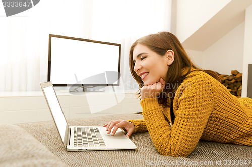 Image of Woman working with her laptop