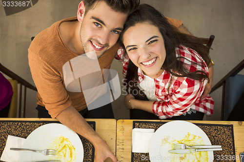 Image of Young couple at the restaurant