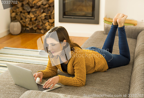 Image of Woman working with her laptop