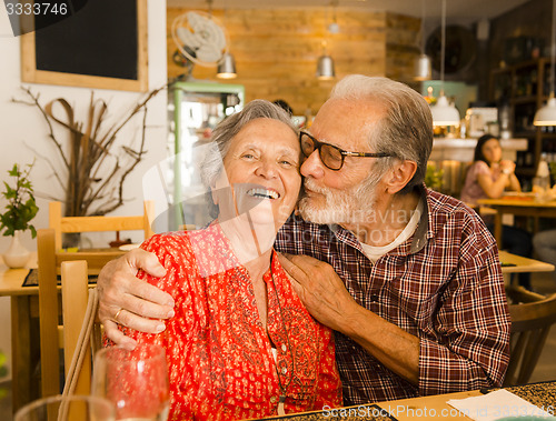 Image of Old couple at the restaurant