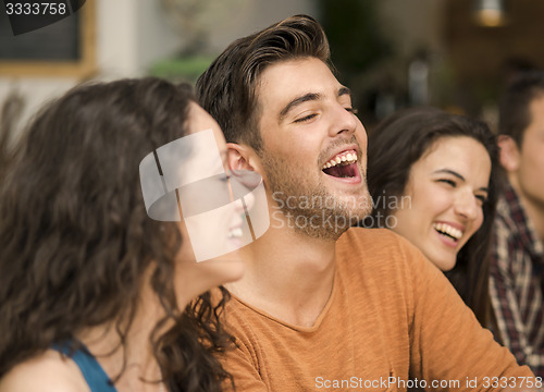 Image of Friends having fun at the restaurant