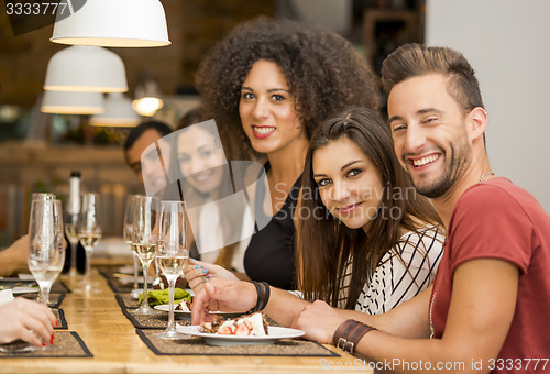 Image of Friends lunching at the restaurant