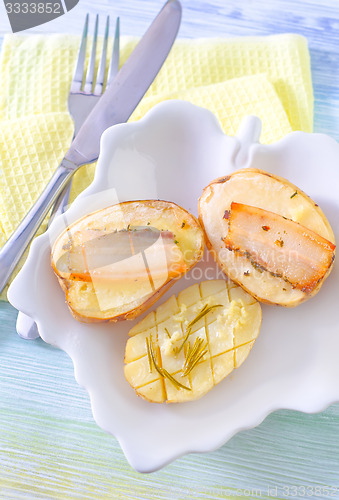 Image of baked potato with lard