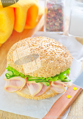 Image of sandwich with ham and cucumber