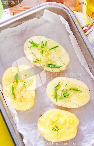 Image of potato with rosemary and garlic