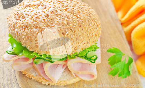 Image of sandwich with ham and cucumber