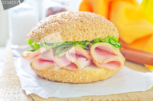 Image of sandwich with ham and cucumber