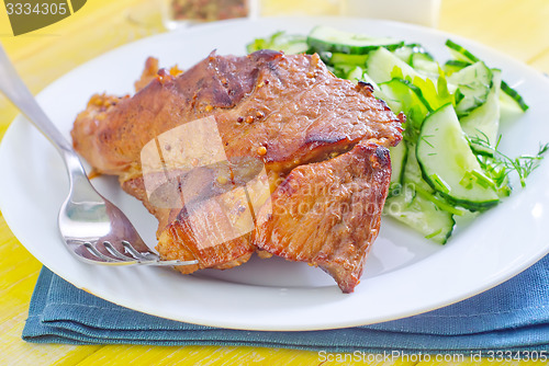 Image of meat with salad