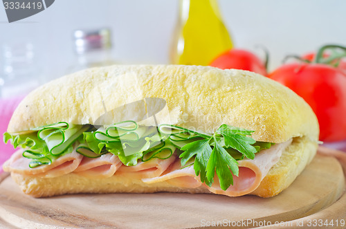 Image of sandwich with ham and cucumber