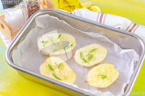 Image of potato with rosemary and garlic