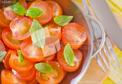 Image of tomato with basil