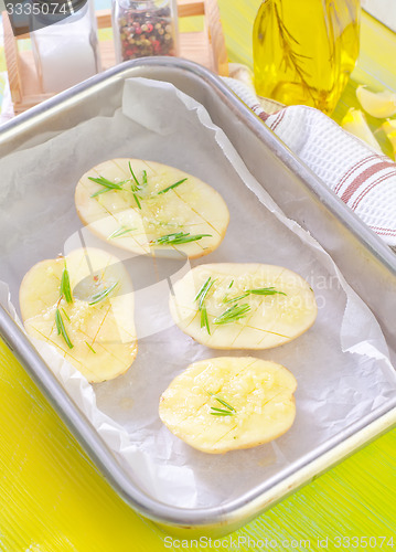 Image of potato with rosemary and garlic