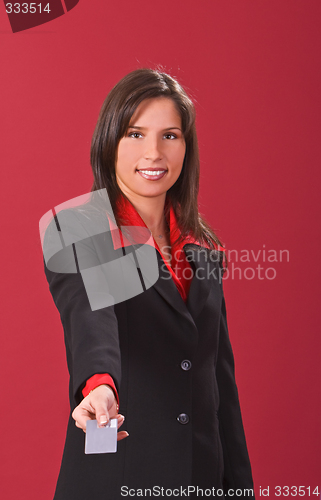 Image of Businesswoman offering a credit card