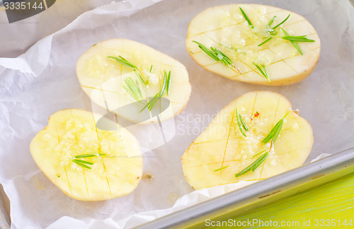 Image of potato with rosemary and garlic