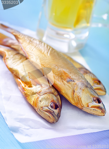 Image of smoked fish with beer