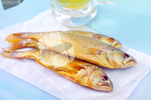 Image of smoked fish with beer