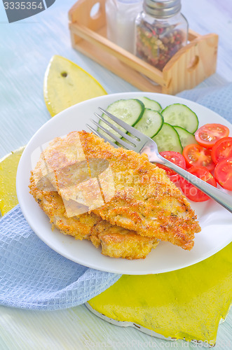 Image of fried chicken with vegetables