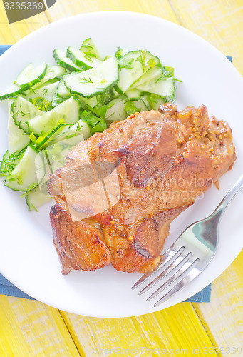 Image of meat with salad