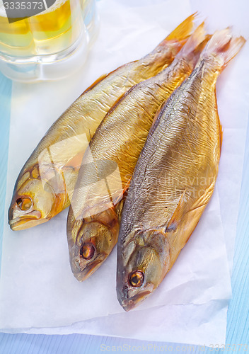 Image of smoked fish with beer