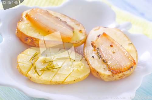 Image of baked potato with lard