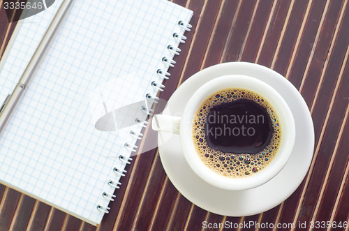 Image of coffee and note