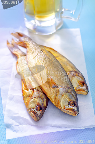 Image of smoked fish with beer