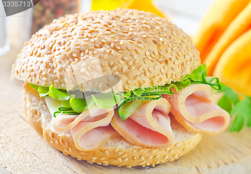 Image of sandwich with ham and cucumber