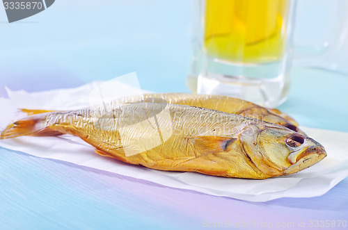 Image of smoked fish with beer