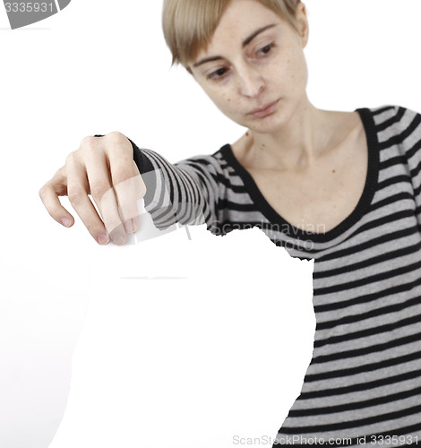 Image of Woman holding a paper