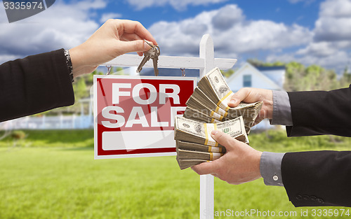 Image of Handing Over Cash for Keys in Front of House, Sign