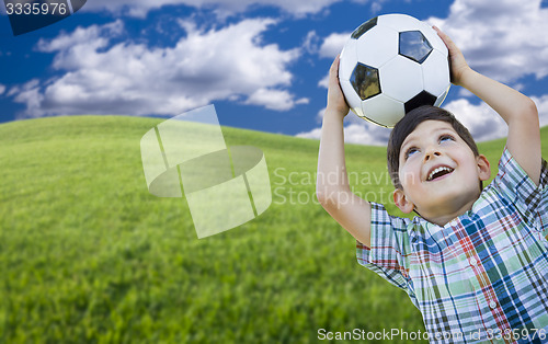 Image of Cute Boy with Soccer Ball in Park