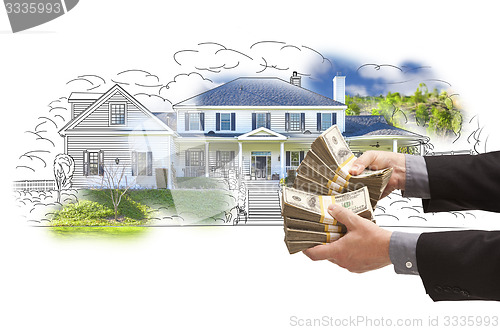 Image of Hand Holding Thousands In Cash Over House Drawing and Photo