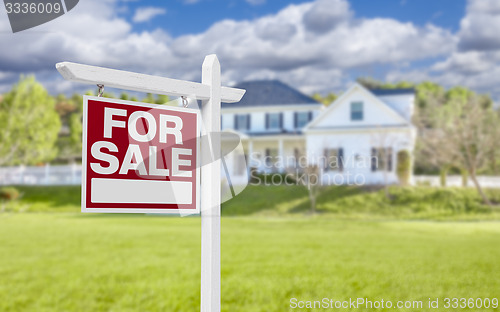 Image of Home For Sale Sign in Front of New House