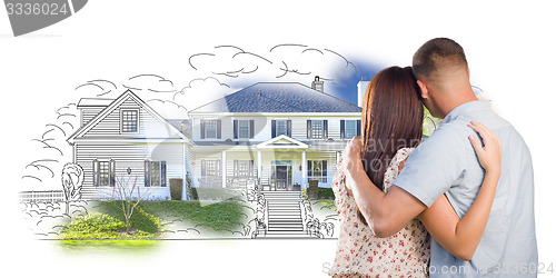 Image of Military Couple Looking At House Drawing and Photo on White