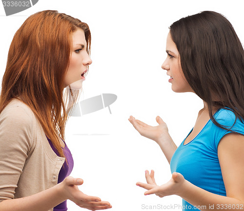 Image of two teenagers having a fight