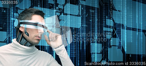 Image of man with futuristic glasses and sensors